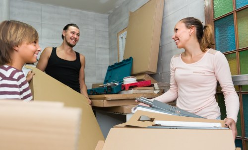 Person reviewing transparent storage pricing for a household clearance