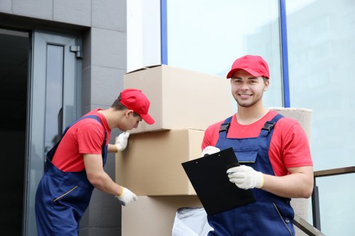 Flat removals planning in Freezywater with packed boxes